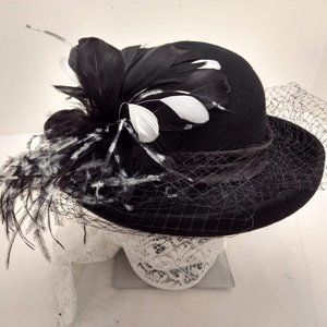 Felt feathered hat by Georgi